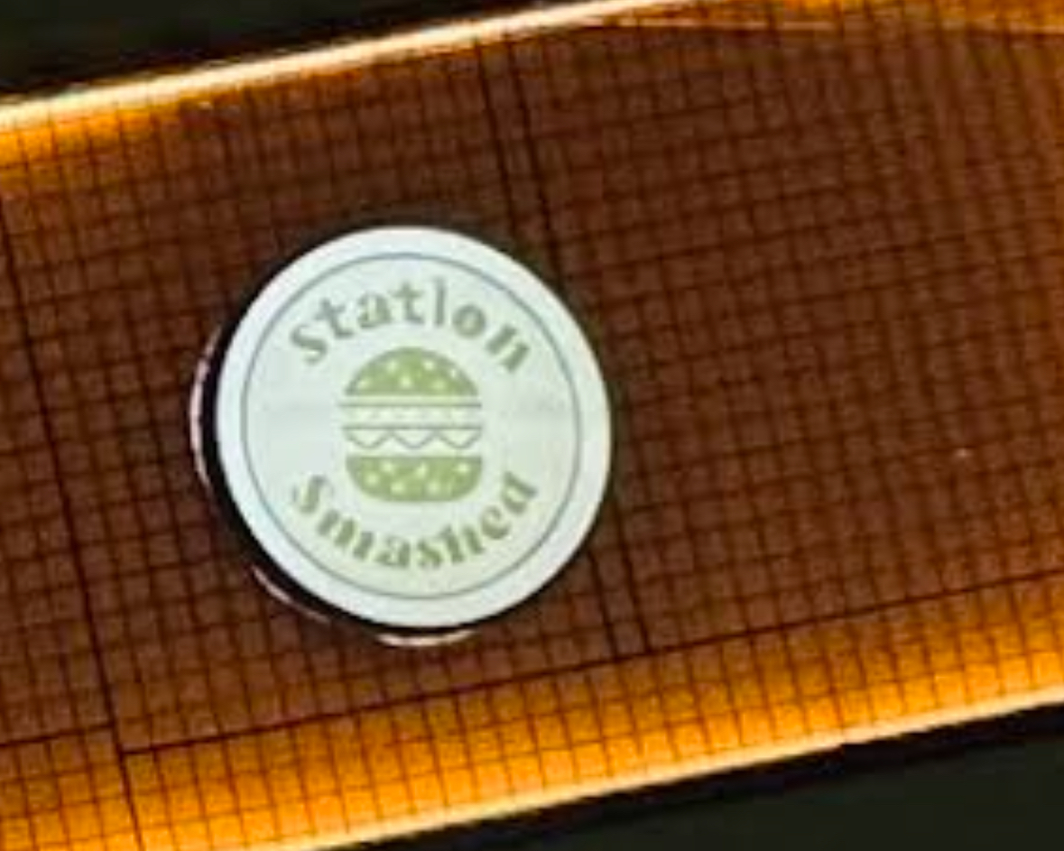 Smashed Station logo sign inside the restaurant